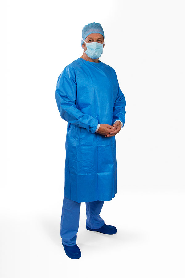 Surgeon wearing elemental poly-reinforced surgical gown with hands folded