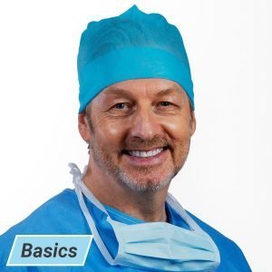 Surgeon wearing basics operating cap with extra length front